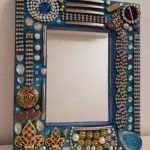 Mirror made from recyled beads reclaimed from old jewellery, by Anne Bickley